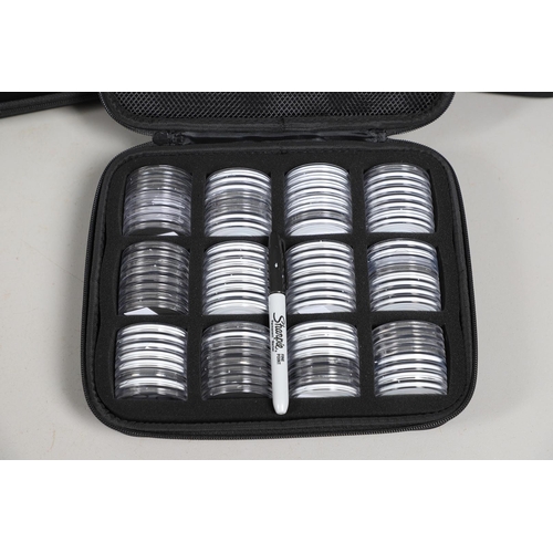 1599 - THREE COIN CASES, EACH CONTAINING 96 CAPSULES. A set of three 'soft-shell' coin cases in black, fitt... 