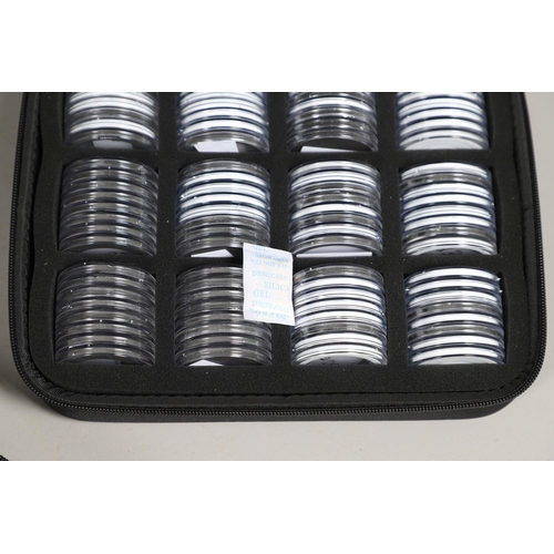 1599 - THREE COIN CASES, EACH CONTAINING 96 CAPSULES. A set of three 'soft-shell' coin cases in black, fitt... 