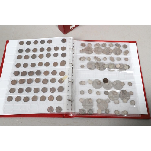 1628 - AN ALBUM OF COINS COMPRISING SOUVENIR CROWNS, FARTHINGS AND FIVE POUND COINS. An album containing Si... 