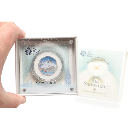 1632 - A COLLECTION OF FIVE SNOWMAN SILVER FIFTY PENCE COINS. Five Royal Mint silver proof 50p coins from t... 