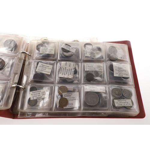 1664 - TWO ALBUMS OF WORLD COINS, THE MAJORITY SECOND HALF OF THE 19TH CENTURY AND LATER. Two albums contai... 