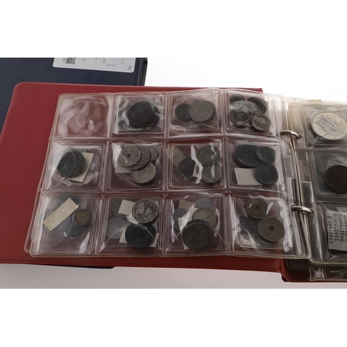 1664 - TWO ALBUMS OF WORLD COINS, THE MAJORITY SECOND HALF OF THE 19TH CENTURY AND LATER. Two albums contai... 