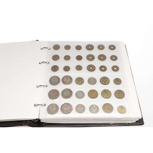 1674 - TURKEY: AN EXTENSIVE ALBUM OF TURKISH COINS. Turkish coins to include: 500 Lira coins, 100 Kurus and... 