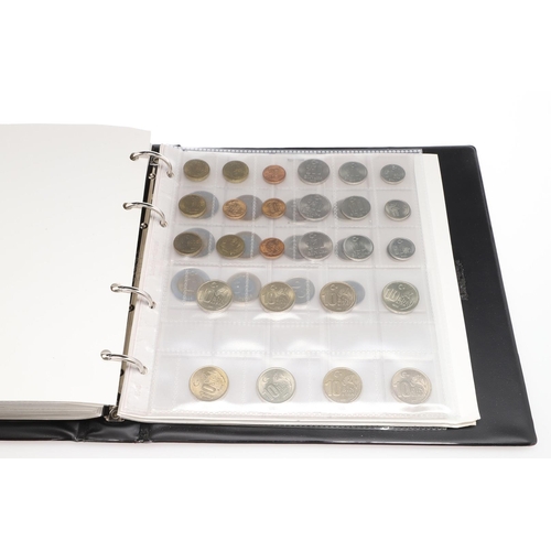 1674 - TURKEY: AN EXTENSIVE ALBUM OF TURKISH COINS. Turkish coins to include: 500 Lira coins, 100 Kurus and... 