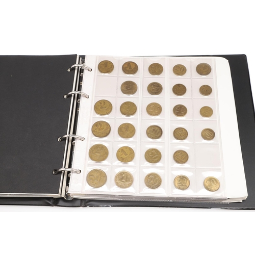 1675 - BRAZIL: AN EXTENSIVE ALBUM OF BRAZILIAN COINS. Brazilian coins to include: 200 Reis for 1871, 400 Re... 