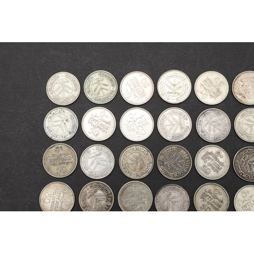 1697 - A COLLECTION OF PALESTINIAN 50 MILS COINS. Palestine coins from the British mandate period, 50 Mils ... 