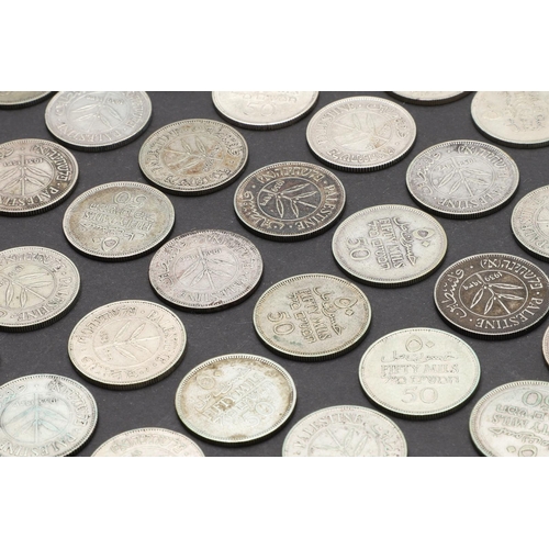 1697 - A COLLECTION OF PALESTINIAN 50 MILS COINS. Palestine coins from the British mandate period, 50 Mils ... 