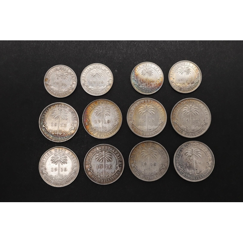 1703 - A COLLECTION OF BRITISH WEST AFRICA COINS, TWO SHILLINGS AND ONE SHILLING PIECES. British West Afric... 