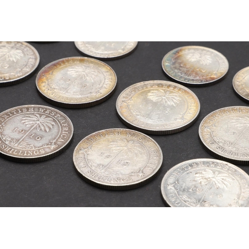 1703 - A COLLECTION OF BRITISH WEST AFRICA COINS, TWO SHILLINGS AND ONE SHILLING PIECES. British West Afric... 