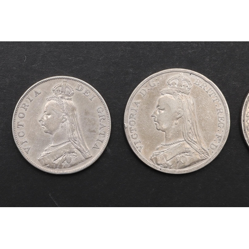 1711 - TWO VICTORIAN CROWNS AND A SIMILAR DOUBLE FLORIN. 1889 AND LATER. A Queen Victoria Crown, Jubilee bu... 