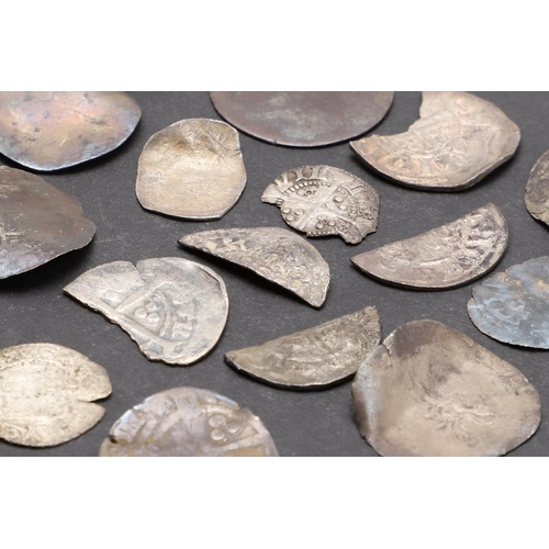 1791 - A COLLECTION OF SILVER HAMMERED CUT FRACTIONAL COINS. Three cut half pennies and a similar farthing ... 