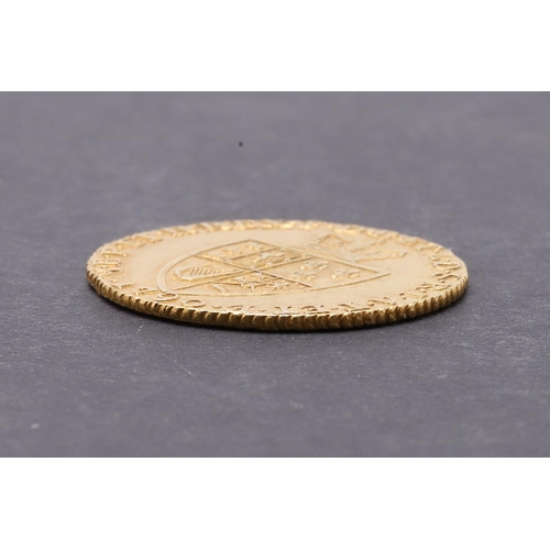 1885 - A GEORGE III 'SPADE' GUINEA, 1790. A George III Guinea, fifth laureate and draped bust r. Reverse wi... 