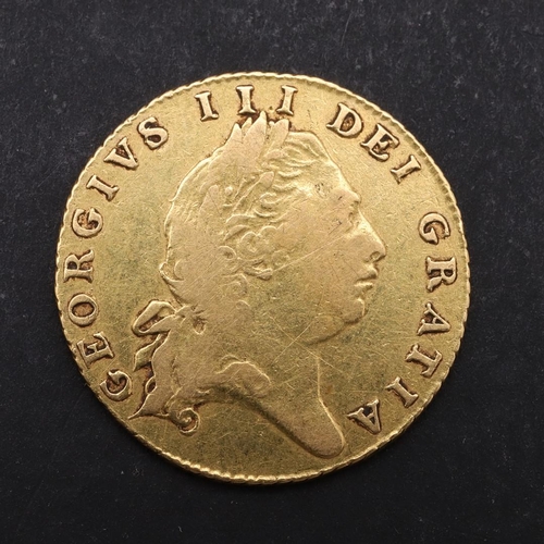 1890 - A GEORGE III HALF-GUINEA 1803. A Half-Guinea, sixth laureate bust r. Reverse shield in Garter above ... 