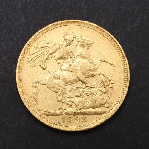 1896 - A GEORGE IV SOVEREIGN, 1823. A George IV Sovereign, laureate bust l, R. St George and the Dragon, da... 