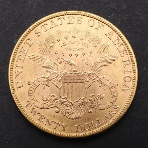 1923 - AN AMERICAN GOLD TWENTY DOLLAR COIN, 1900. A gold 20 dollar 'double eagle' coin. Liberty head l. ben... 