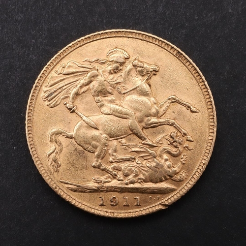 1951 - A GEORGE V SOVEREIGN. 1911. A George V Sovereign, bare head bust r. reverse St George and the Dragon... 