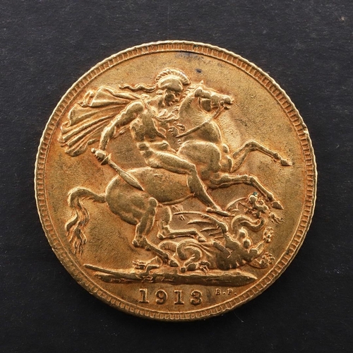 1957 - A GEORGE V SOVEREIGN, 1913. A George V Sovereign, bare head l. reverse St George and the Dragon, dat... 