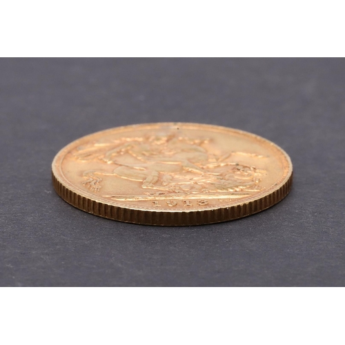 1957 - A GEORGE V SOVEREIGN, 1913. A George V Sovereign, bare head l. reverse St George and the Dragon, dat... 