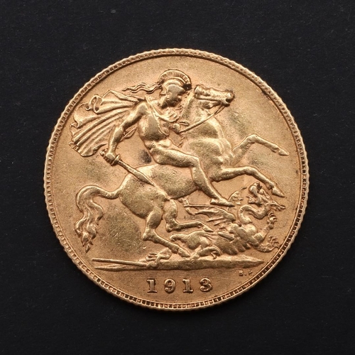 1958 - A GEORGE V HALF SOVEREIGN, 1913. A George V Half Sovereign, bust l. St George and the Dragon reverse... 