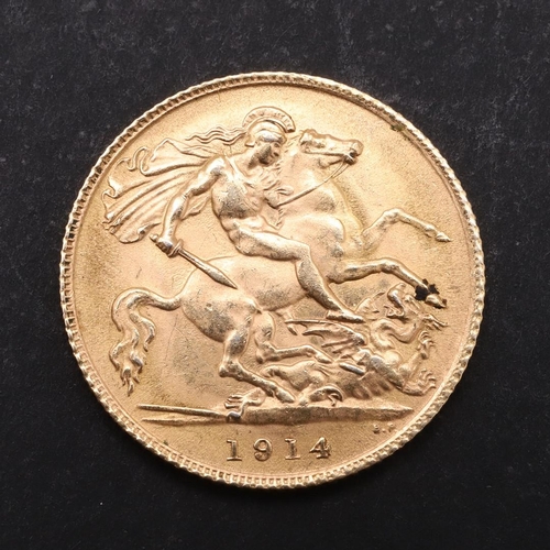 1963 - A GEORGE V HALF SOVEREIGN, 1914. A George V Half Sovereign, bare head l. reverse St. George and the ... 