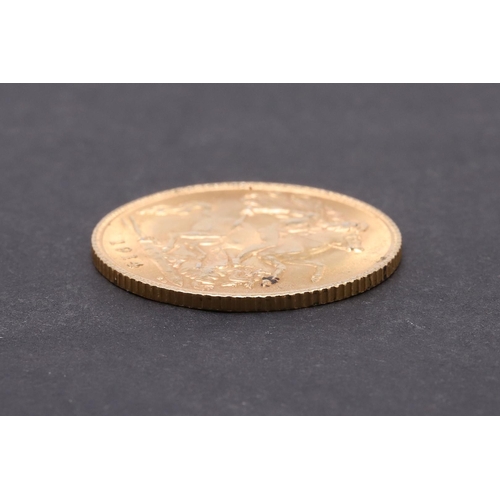 1963 - A GEORGE V HALF SOVEREIGN, 1914. A George V Half Sovereign, bare head l. reverse St. George and the ... 