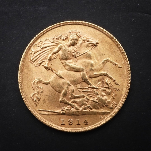 1964 - A GEORGE V HALF SOVEREIGN, 1914. A George V Half Sovereign, bare head l. reverse George and the Drag... 