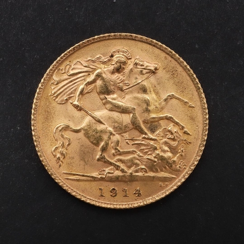 1965 - A GEORGE V HALF SOVEREIGN, 1914. A George V Half Sovereign, bare head l. reverse George and the drag... 