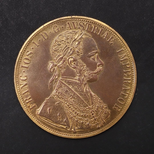 1968 - A RESTRIKE AUSTRIAN GOLD 4 DUCAT PIECE WITH DATE 1915, IN LIGHT MOUNT. Laureate bust of Franz Joseph... 