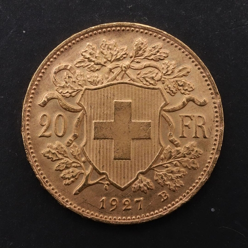 1978 - A SWISS 20 FRANC COIN, 1927. A 20 Franc gold coin, head of Helvetia left, reverse dated 1927, Mint m... 