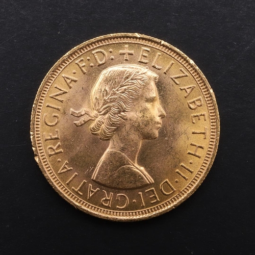 1980 - AN ELIZABETH II SOVEREIGN, 1957. An Elizabeth II Sovereign, bare head r. reverse George and the drag... 