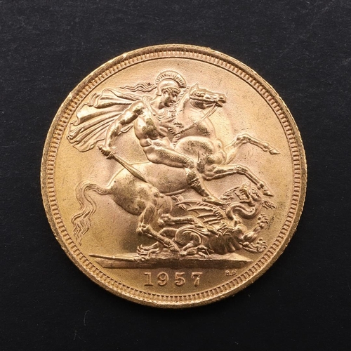 1980 - AN ELIZABETH II SOVEREIGN, 1957. An Elizabeth II Sovereign, bare head r. reverse George and the drag... 