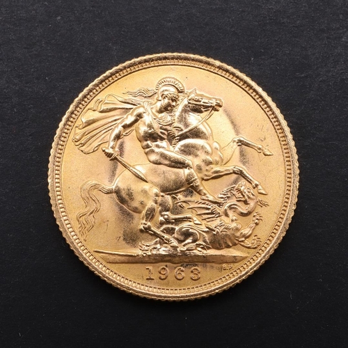 1986 - AN ELIZABETH II SOVEREIGN, 1963. An Elizabeth II Sovereign, bare head r. reverse George and the drag... 