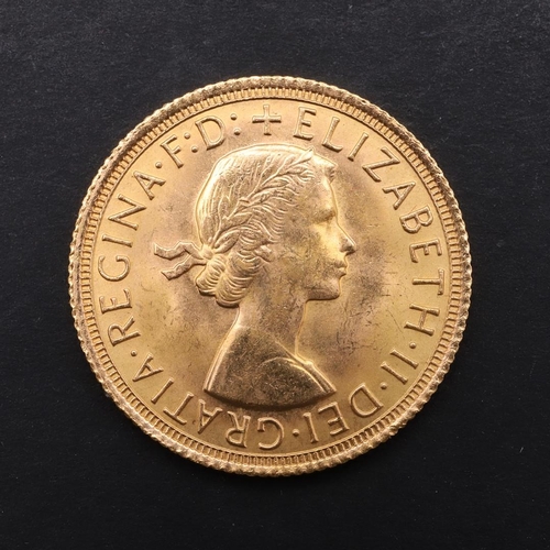 1989 - AN ELIZABETH II SOVEREIGN, 1966. An Elizabeth II Sovereign, bare head r. reverse George and the drag... 