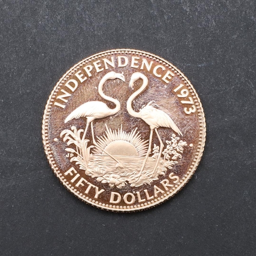 1996 - A BAHAMAS INDEPENDENCE GOLD FIFTY DOLLAR COIN. 1973. An Elizabeth II Bahamas 50 Dollar coin, crowned... 