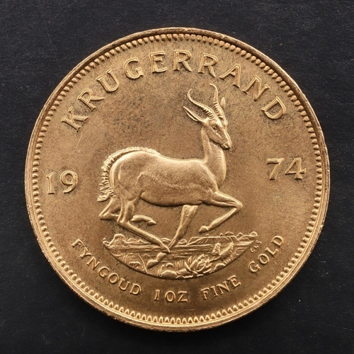 2002 - A SOUTH AFRICA GOLD KRUGERRAND, 1974. A Krugerrand, Reverse dated 1974 'Fyngoud 1 oz Fine Gold'.