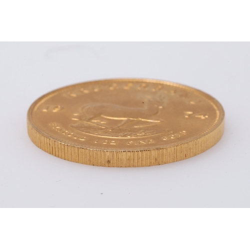 2002 - A SOUTH AFRICA GOLD KRUGERRAND, 1974. A Krugerrand, Reverse dated 1974 'Fyngoud 1 oz Fine Gold'.