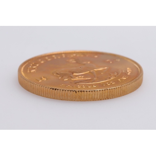 2003 - A SOUTH AFRICAN GOLD KRUGERRAND, 1974. A South African Kruggerand, dated 1974. '1 oz Fine Gold'. 32.... 