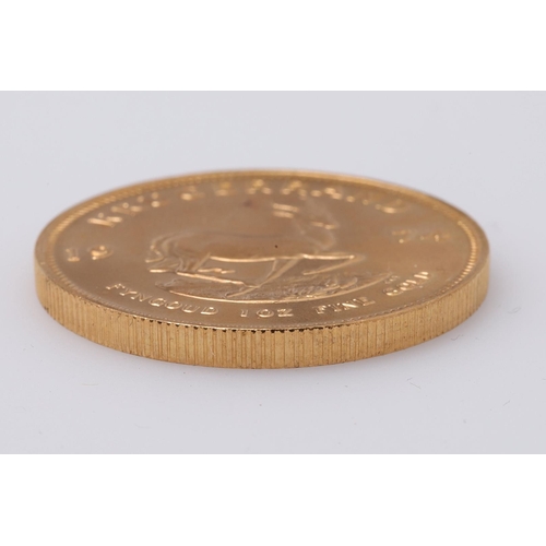 2004 - A SOUTH AFRICA GOLD KRUGERRAND, 1974. A Krugerrand, Reverse dated 1974 'Fyngoud 1 oz Fine Gold'.