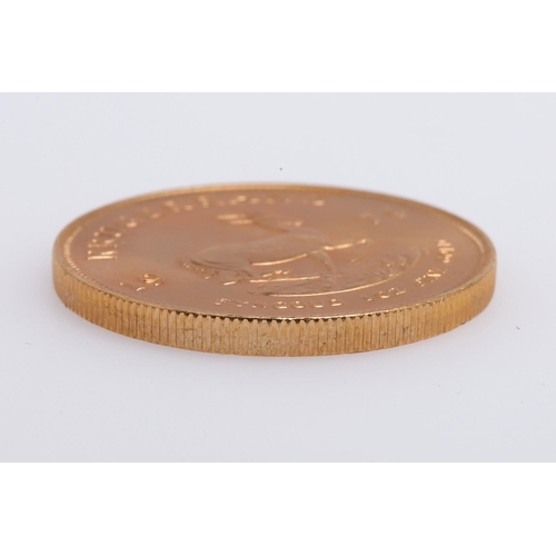 2007 - A SOUTH AFRICAN GOLD KRUGERRAND, 1974. A South African Kruggerand, dated 1974. '1 oz Fine Gold'. 32.... 