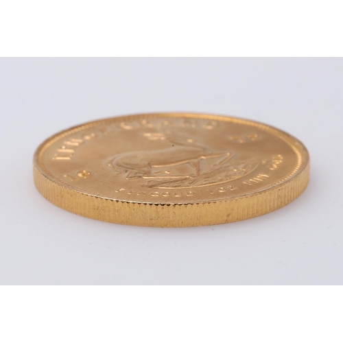 2010 - A SOUTH AFRICA GOLD KRUGERRAND, 1975. A Krugerrand, Reverse dated 1975 'Fyngoud 1 oz Fine Gold'.