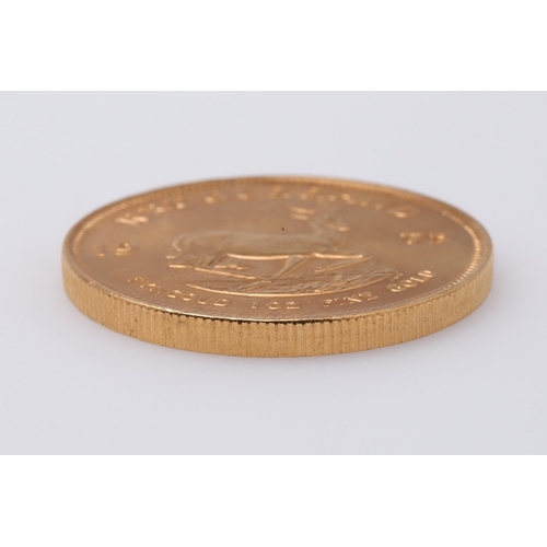 2011 - A SOUTH AFRICA GOLD KRUGERRAND, 1975. A Krugerrand, Reverse dated 1975 'Fyngoud 1 oz Fine Gold'.