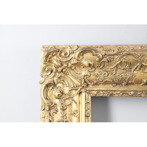 339 - A 19th CENTURY GILT PICTURE FRAME. With stylised leafy scroll and flower borders, 11cm section To fi... 