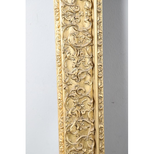 339 - A 19th CENTURY GILT PICTURE FRAME. With stylised leafy scroll and flower borders, 11cm section To fi... 