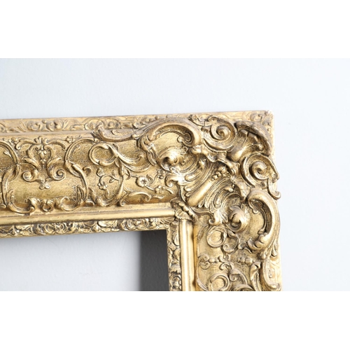 339 - A 19th CENTURY GILT PICTURE FRAME. With stylised leafy scroll and flower borders, 11cm section To fi... 