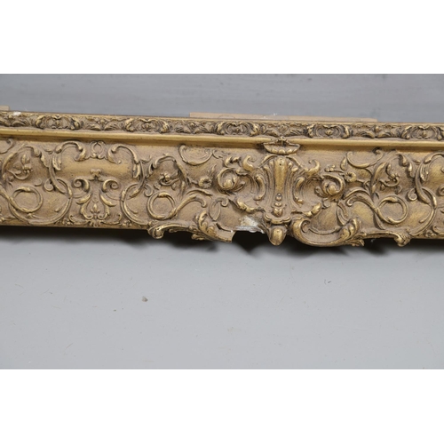 339 - A 19th CENTURY GILT PICTURE FRAME. With stylised leafy scroll and flower borders, 11cm section To fi... 