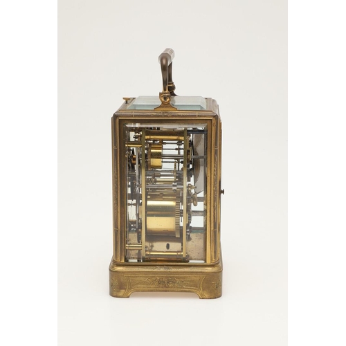 374 - A 19TH CENTURY FRENCH BRASS REPEATER CARRIAGE CLOCK. the white enamel dial with Roman numerals and a... 