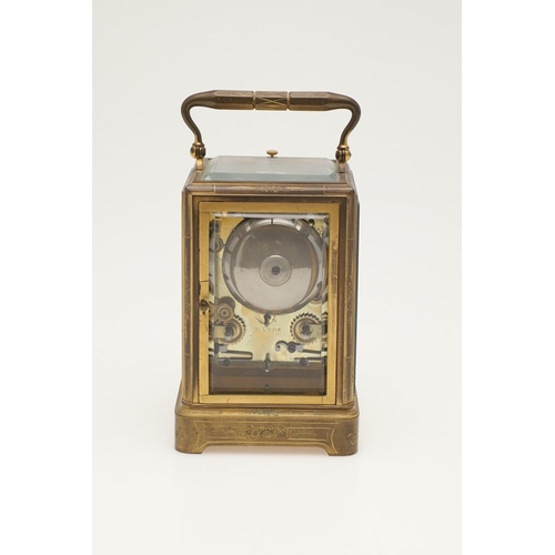 374 - A 19TH CENTURY FRENCH BRASS REPEATER CARRIAGE CLOCK. the white enamel dial with Roman numerals and a... 