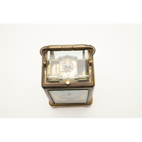 374 - A 19TH CENTURY FRENCH BRASS REPEATER CARRIAGE CLOCK. the white enamel dial with Roman numerals and a... 