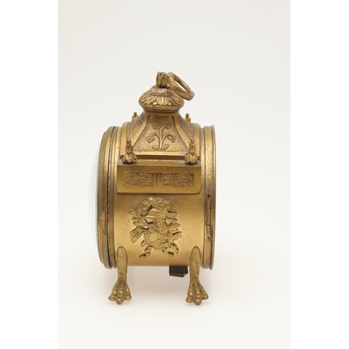 376 - A FRENCH EMPIRE STYLE GILT METAL DRUM CLOCK. late 19th century, with an eight day movement striking ... 