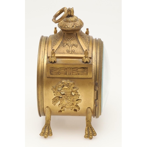 376 - A FRENCH EMPIRE STYLE GILT METAL DRUM CLOCK. late 19th century, with an eight day movement striking ... 